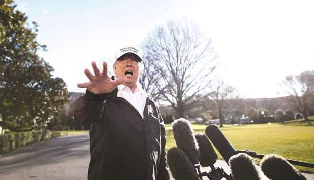 Trump speaks to the press before leaving for the US-Mexico border as part of his all-out offensive to build a wall, a day after he stormed out of negotiations when Democratic opponents refused to agree to fund the project in exchange for an end to a painful government shutdown.