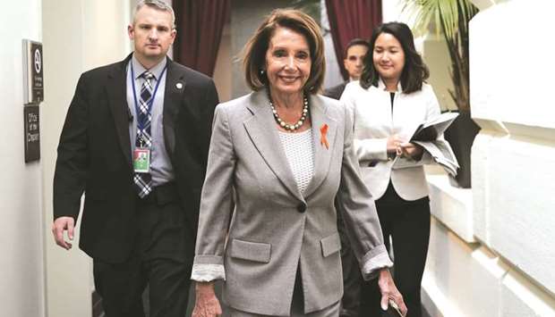 US Speaker of the House Nancy Pelosi, arrives at a House Democratic Caucus meeting at the US Capitol on January 9 in Washington, DC. House Democrats discuss Democratic agenda as the partial government shutdown entered day 19 on Wednesday.