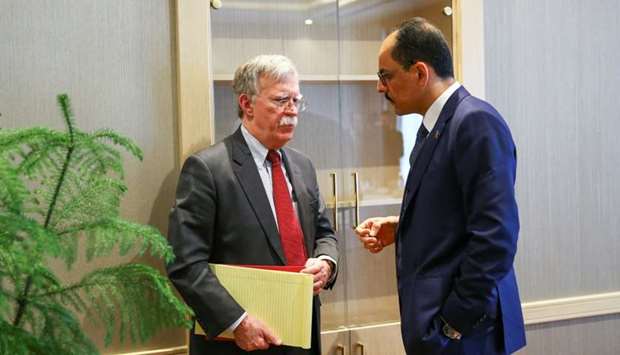 U.S. National Security Adviser John Bolton and his Turkish counterpart Ibrahim Kalin (R) meet at the Presidential Palace in Ankara, Turkey on January 8. Reuters