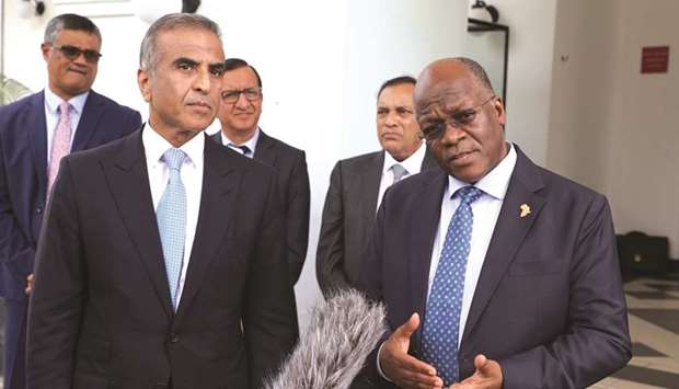 Tanzaniau2019s President John Magufuli (right) flanked by Bharti Airtelu2019s chairman Sunil Mittal address the media at State House in Dar es Salaam, Tanzania. Bharti Airtel has agreed to give part of its stake in Airtel Tanzania to the government, raising the East African nationu2019s holding in the mobile phone operator to 49% from 40%, the presidentu2019s office said yesterday.