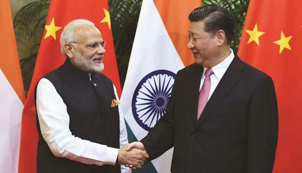 Indian Prime Minister Narendra Modi (left) and Chinese President Xi Jinping at a meeting in Wuhan, China (file). Indiau2019s  imports from China have been rising for a while with the deficit reaching $55.6bn in 2017 compared to $48.19bn in 2015.