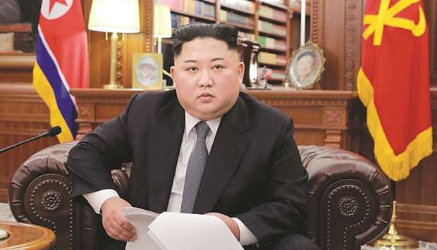 North Korean leader Kim Jong-un delivering an address to mark the New Year at an undisclosed location yesterday.