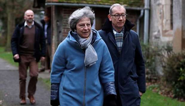Britain's Prime Minister Theresa May and her husband Philip leave church, near High Wycombe, Britain