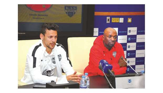 Al Duhailu2019s Youssef Msakni (left) and KAS Eupen coach Claude Makelele address a press conference at Aspire Academy yesterday.