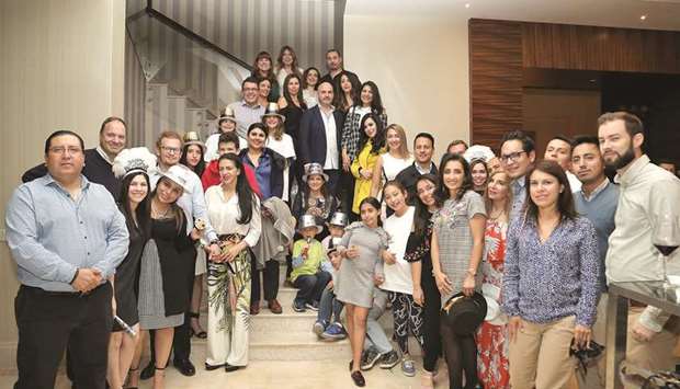 GROUP: Nearly 70 Ecuadorian families among other diplomats and their families gathered to celebrate New Yearsu2019 at St Regis Doha. Photos by Jayan Orma