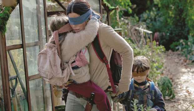 PREMISE: In a post-apocalyptic world, haunted by beings that cause psychotic behaviour in nearly anyone who looks at them, Mallory (Sandra Bullock) tries to protect two small children while traveling to what she hopes is a safe colony.