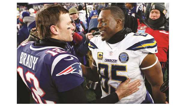 Los Angeles Chargers tight end Antonio Gates (right) with New England Patriots quarterback Tom Brady after their AFC Divisional playoff game at Gillette Stadium. PICTURE: USA TODAY Sports
