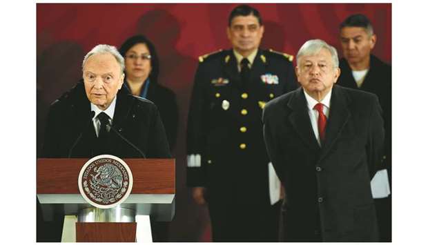 Mexicou2019s Attorney General Alejandro Gertz (left) speaks as President Andres Manuel Lopez Obrador (right) listens during a press conference on measures taken by the government to combat fuel theft, at the National Palace in Mexico City.