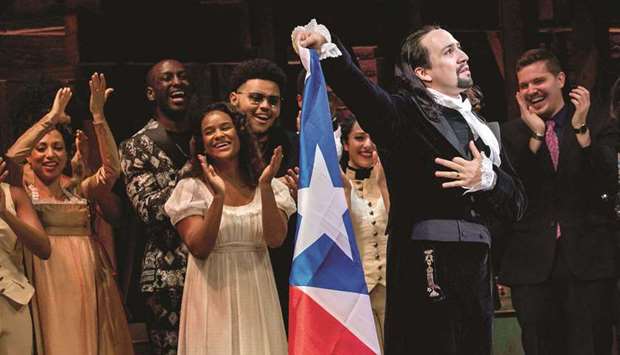STAR OF THE SHOW: Lin-Manuel Miranda, composer and creator of the award-winning Broadway musical Hamilton, gets emotional as he stands with cast at curtain call of the show.