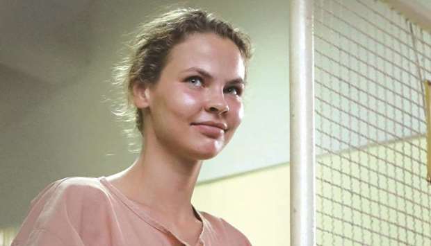 Belarusian model Anastasia Vashukevich better known by her pen name Nastya Rybka, preparing to board a prison van after a court trial in Pattaya.