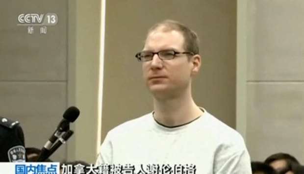 A still image taken from CCTV video shows Canadian Robert Lloyd Schellenberg in court