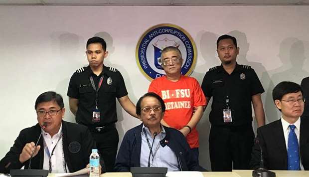 Chinese fugitive Xie Haojie presented in a press conference by Philippine authorities following his arrest.  Picture courtesy: Faye Orellana/Inquirer.net