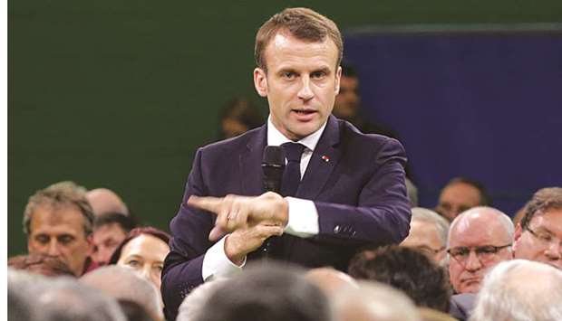 Macron delivers a speech during a meeting in Grand Bourgtheroulde with mayors from rural Normandy as part of the launching of the u2018Great National Debateu2019, designed to find ways to calm social unrest in the country.
