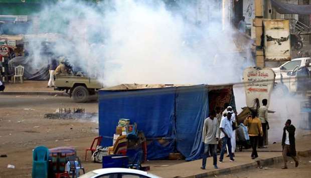 A tear gas canister fired to disperse Sudanese demonstrators, during anti-government protests in the outskirts of Khartoum