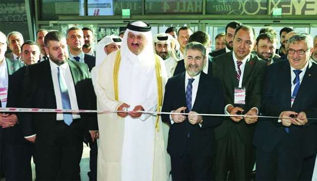 Al-Khater inaugurating the third edition of Turkey Expo Qatar, as Fikret Ozer, Turkish Ambassador to Qatar, looks on.