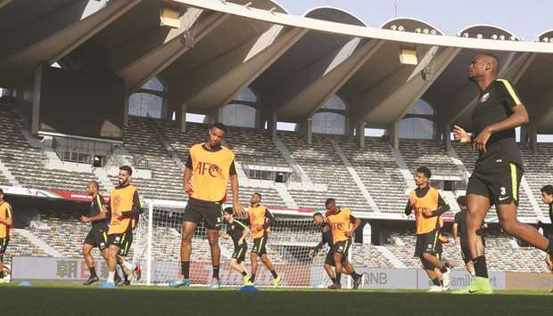 Qatar players train ahead of their match against Saudi Arabia today.