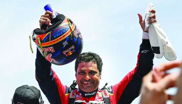 Toyota driver Nasser al-Attiyah of Qatar celebrates after winning the Dakar Rally 2019, at the end of the last stage between Pisco and Lima, in Peru on Thursday. Al-Attiyah and his co-driver Mathieu Baumel of France finished ahead of Mini's Nani Roma and co-driver Alexandre Haro Bravo of Spain.
