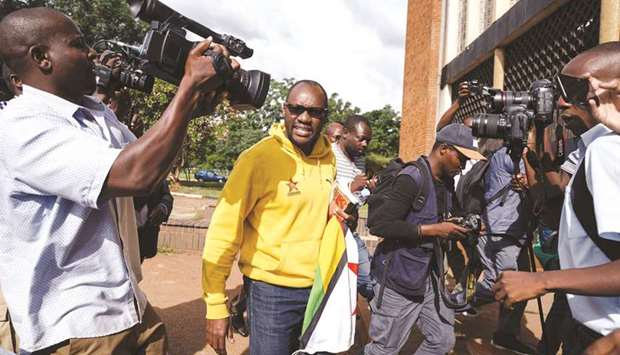 Zimbabwe activist Pastor Evan Mawarire arrives at the Harare Magistrates Court yesterday.