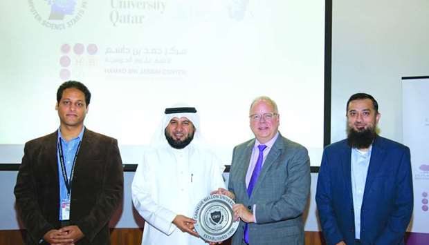 CMU-Q and Jassim and Hamad Bin Jassim Charitable Foundation officials at a ceremony.