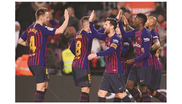 Barcelona players celebrate after they beat Levante in Spainu2019s Copa del Rey round of 16 match on Thursday night. (AFP)