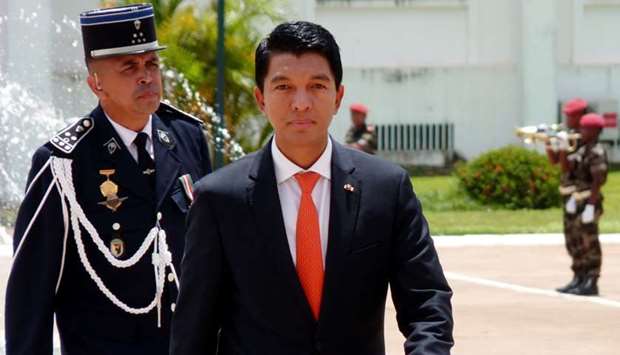 Madagascar's President elect Andry Rajoelina arrives for the ceremony of handing over of power from the outgoing President Hery Rajaonarimampianina yesterday in Antananarivo, Madagascar