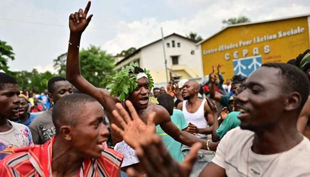 Supporters of Felix Tshisekedi, DR Congo's opposition politician declared winner of the December's presidential poll, sing in the streets of Kinshasa January 19, 2019 as they wait for an expected ruling in a case of another opposition candidate challenging the controversial result announced by the Commission electorale nationale independante