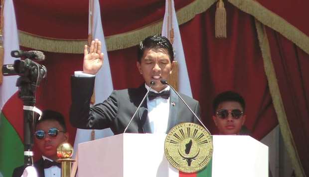 Madagascaru2019s President Andry Rajoelina takes oath of office during his inauguration ceremony in Antananarivo, yesterday.