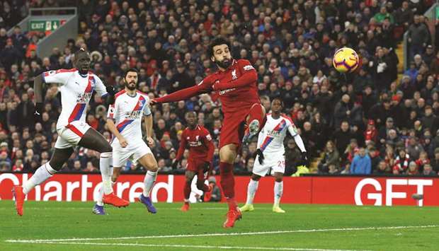 Liverpoolu2019s Mohamed Salah scores their first goal against Crystal Palace yesterday.
