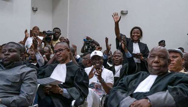 UDPS lawyers, representing Felix Tshisekedi, celebrate following the pronouncement of the judges of the Constitutional Court which invalidated Martin Fayulu's appeal and confirmed Tshisekedi's victory in the presidential election in Kinshasa