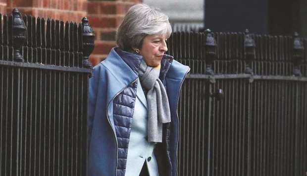 Britainu2019s Prime Minister Theresa May leaves Downing Street, London on Friday. Sterling has just completed a fifth weekly gain versus the dollar, buoyed by speculation the prime minister will need to adopt a Brexit plan that keeps the UK closer to the European Union in order to win over parliament.
