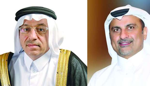 Masraf Al Rayan chairman and managing director Dr Hussain al-Abdulla (L), Group chief executive officer Adel Mustafawi