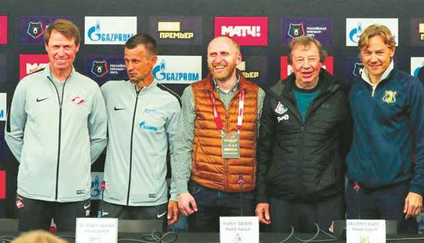 Head Coaches of Zenit St. Petersburg, Spartak Moscow, Lokomotiv Moscow and Rostov pose after a press conference at Aspire Zone yesterday.