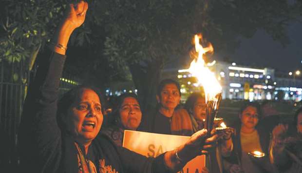 A candlelight vigil was held in New Delhi yesterday to protest against the Supreme Courtu2019s order revoking the traditional ban on the entry of women to the Sabarimala temple.