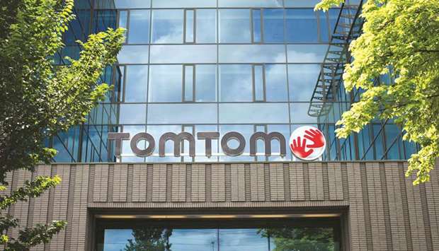 The TomTom logo sits on the exterior of TomTomu2019s headquarters in Amsterdam. TomTom faces a turning point after Google broke into the market to supply maps to car makers last year, striking deals with Renault and Volvo and upsetting a duopoly between TomTom and its traditional larger rival HERE.