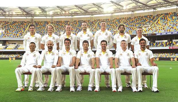 Australian cricket team pose for a photo before a practice session at the Gabba Cricket Ground in Brisbane yesterday. (AFP)
