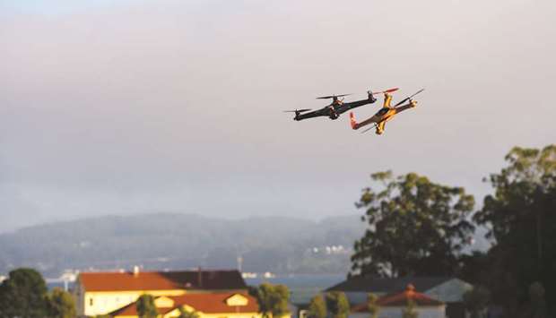 Drones fly during a demonstration at the Bloomberg Next Big Thing Summit in Sausalito, California (file). New research suggests that small unmanned aerial vehicles (UAVs) can actually be much more damaging than birds at the same impact speed, even if they are of similar weight.