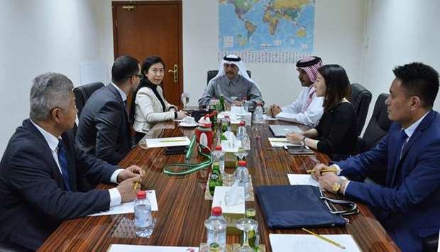 Ali Bu Sherbak al-Mansouri, Qatar Chamber assistant director general for Government Relations and Committee Affairs, holds a meeting with the Arab-China Centre for International Partnership at the chamber's headquarters yesterday.