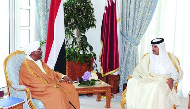 His Highness the Amir Sheikh Tamim bin Hamad al-Thani meets Sudanese President Omar Hassan al-Bashir at the Amiri Diwan