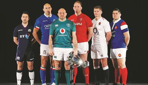 (L-R) Six Nations rugby captains Scotlandu2019s Greig Laidlaw, Italyu2019s Sergio Parisse, Irelandu2019s Rory Best, Walesu2019 Alun Wyn Jones, Englandu2019s Owen Farrell and Franceu2019s Guilhem Guirado pose with the trophy during the Six Nations launch event at The Hurlingham Club in London yesterday. (AFP)