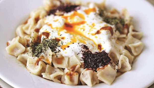 POPULAR: Beef manti is served hot garnished with mint powder.