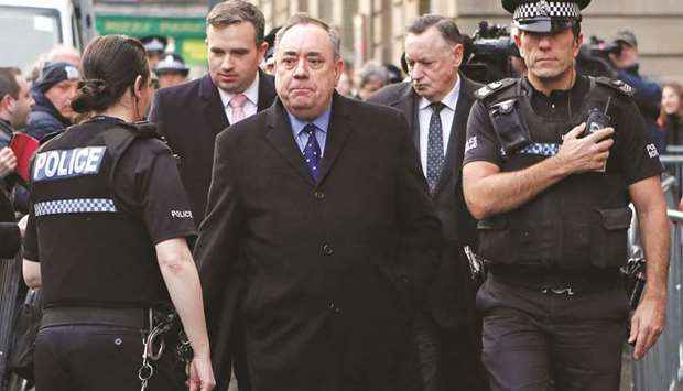 Former first minister of Scotland Alex Salmond leaves after his court appearance at the Edinburgh Sheriff Court, in Edinburgh, Scotland, yesterday.