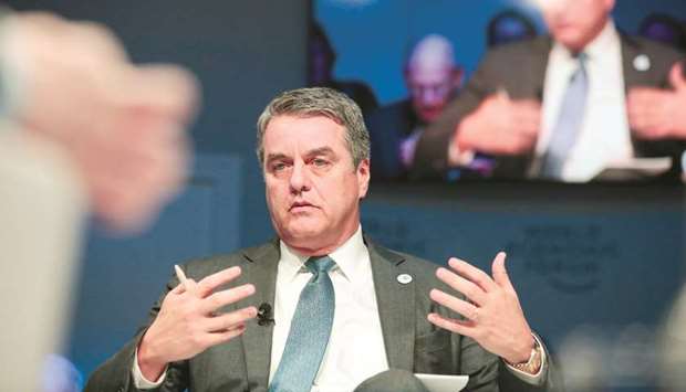 WTO director-general Roberto Azevedo gestures as he speaks during a panel session on day three of the World Economic Forum in Davos on Thursday. u201cIu2019ve said for quite some time it was unacceptable that by 2018... the WTO wonu2019t have a deeper, more effective conversation about e-commerce, a phenomenon that is driving the global economy today,u201d Azevedo said.