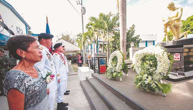 Philippine National Police chief Oscar Albayalde leads the day of remembrance for the SAF 44, the 44 members of the Special Action Force who died during an encounter with rebels four years ago, at the SAF headquarters in Bicutan, Taguig, yesterday.