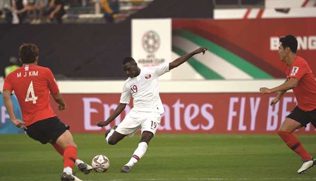 Qataru2019s Almoez Ali (right) in action during the 2019 AFC Asian Cup quarter-final against South Korea in Abu Dhabi on Friday. (AFP)