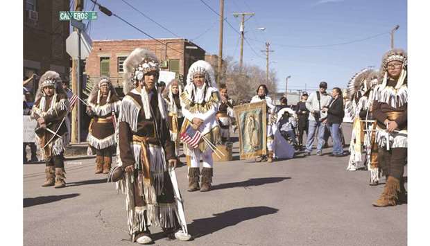 Native American dancers perform during a march denouncing the border wall and calling for immigration reform in El Paso, Texas. About 900 people showed up to march in defiance of President Donald Trumpu2019s proposed border wall, which led to a 35-day government shutdown.