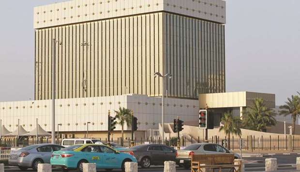 Cars drive past the building of Qatar Central Bank in Doha (file). Qatar banksu2019 asset growth was 4.6% y-o-y in November while credit growth stood at 2.1%, the QNB report says.