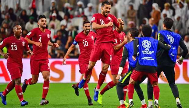 Qatar's midfielder Boualem Khoukhi (C) celebrates during the 2019 AFC Asian Cup semi-final football match between Qatar and UAE