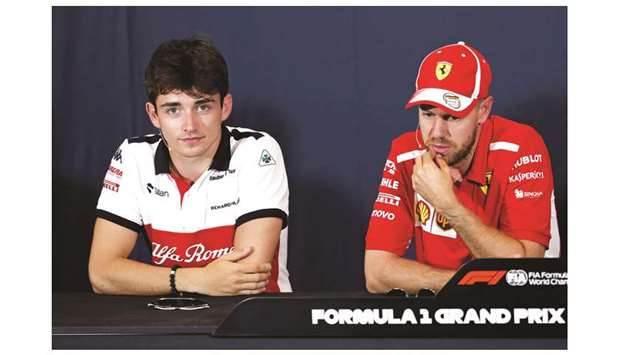 Sauberu2019s Charles Leclerc and Ferrariu2019s Sebastian Vettel (right) during a news conference ahead of the Monaco Grand Prix on May 23, 2018. (Reuters)