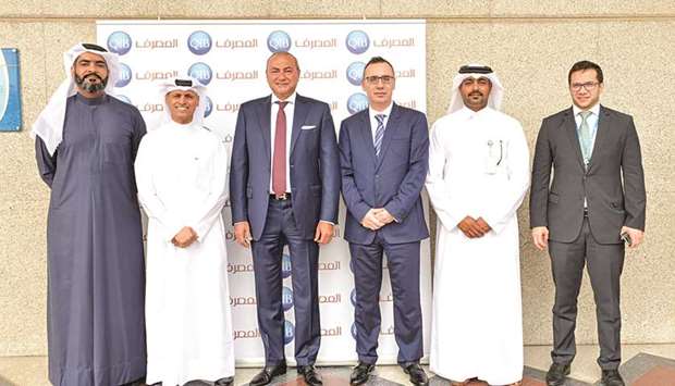 Bassel Gamal and other QIB senior executives.