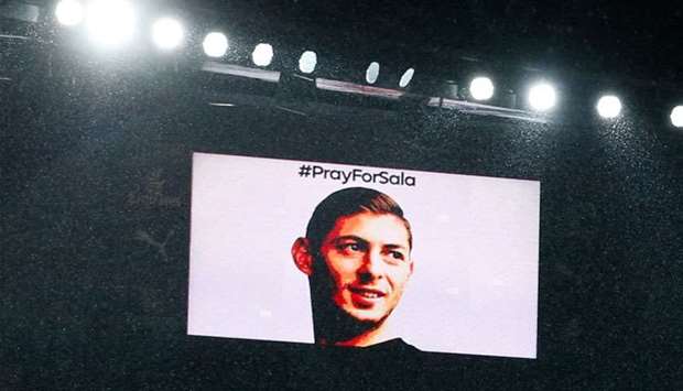 The big screen shows the face of Cardiff City's missing Argentinian player Emiliano Sala